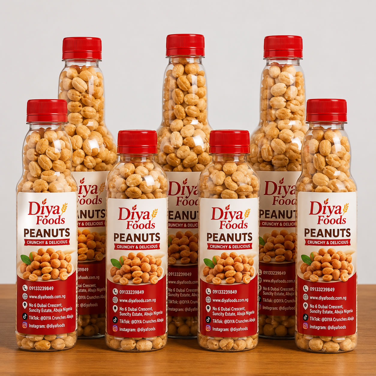 Bottled Odiya Foods coated peanuts lined up on a table